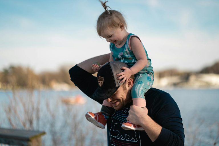 Man plays with his baby