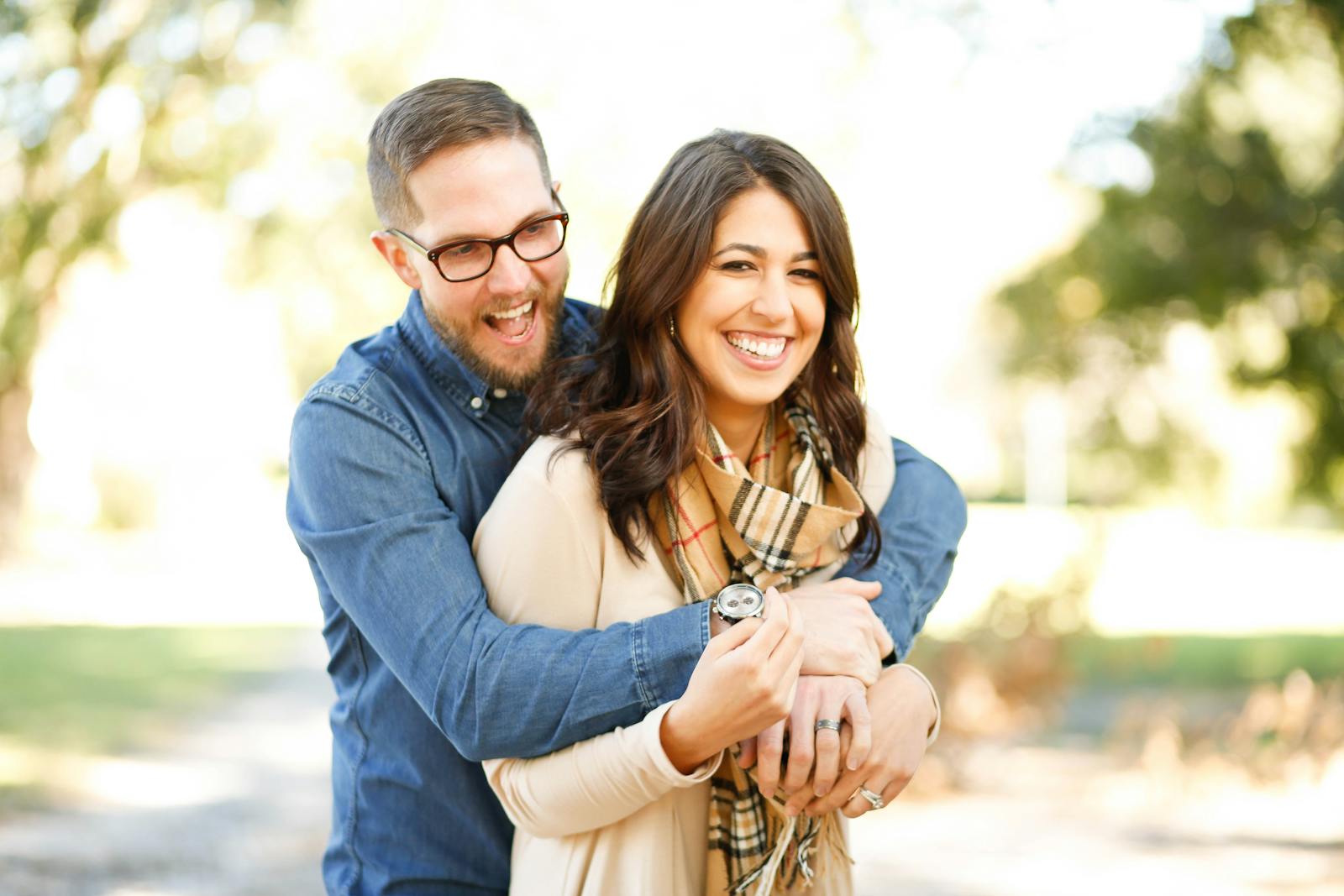 Happy couple hugging and smiling