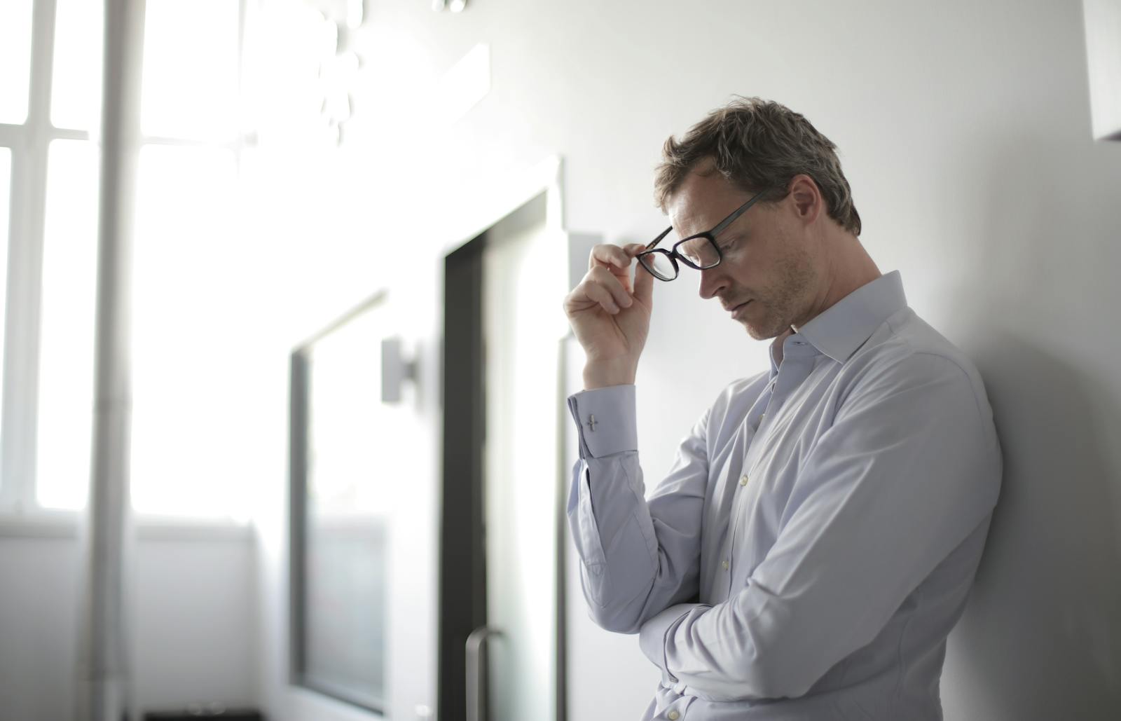 Man having headache before divorce