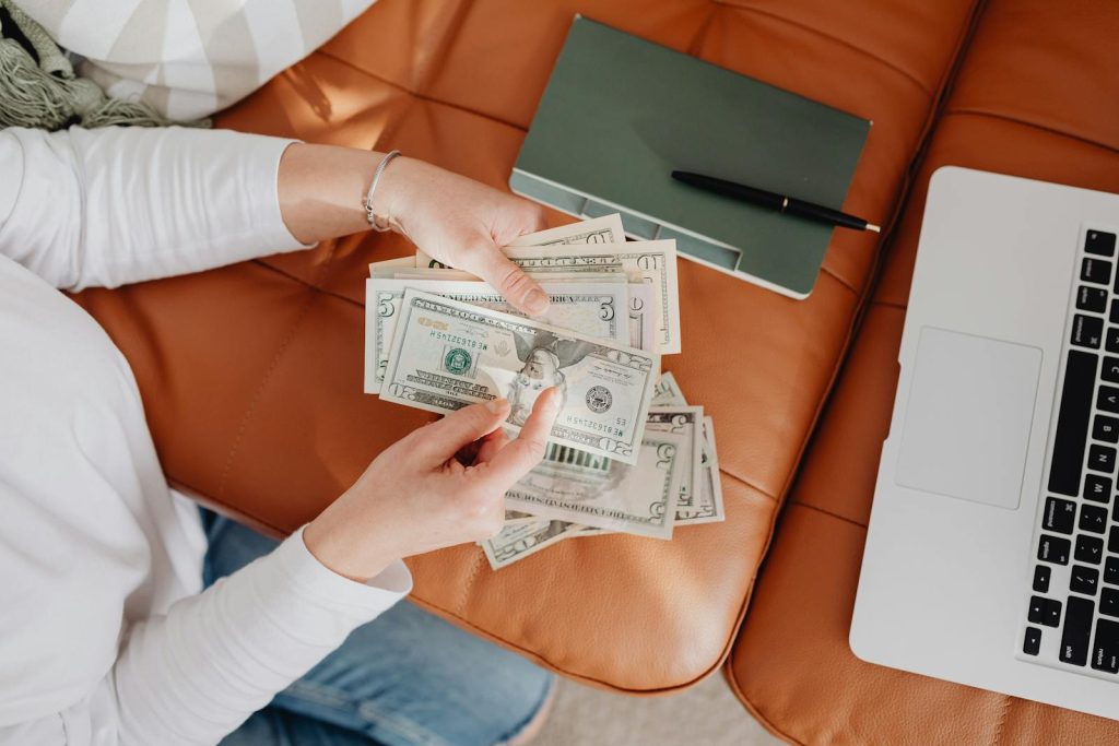 Woman counting the alimony she received