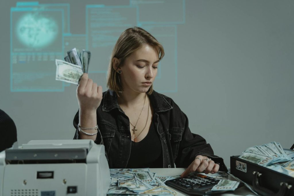 Woman counting money on divorce mediation