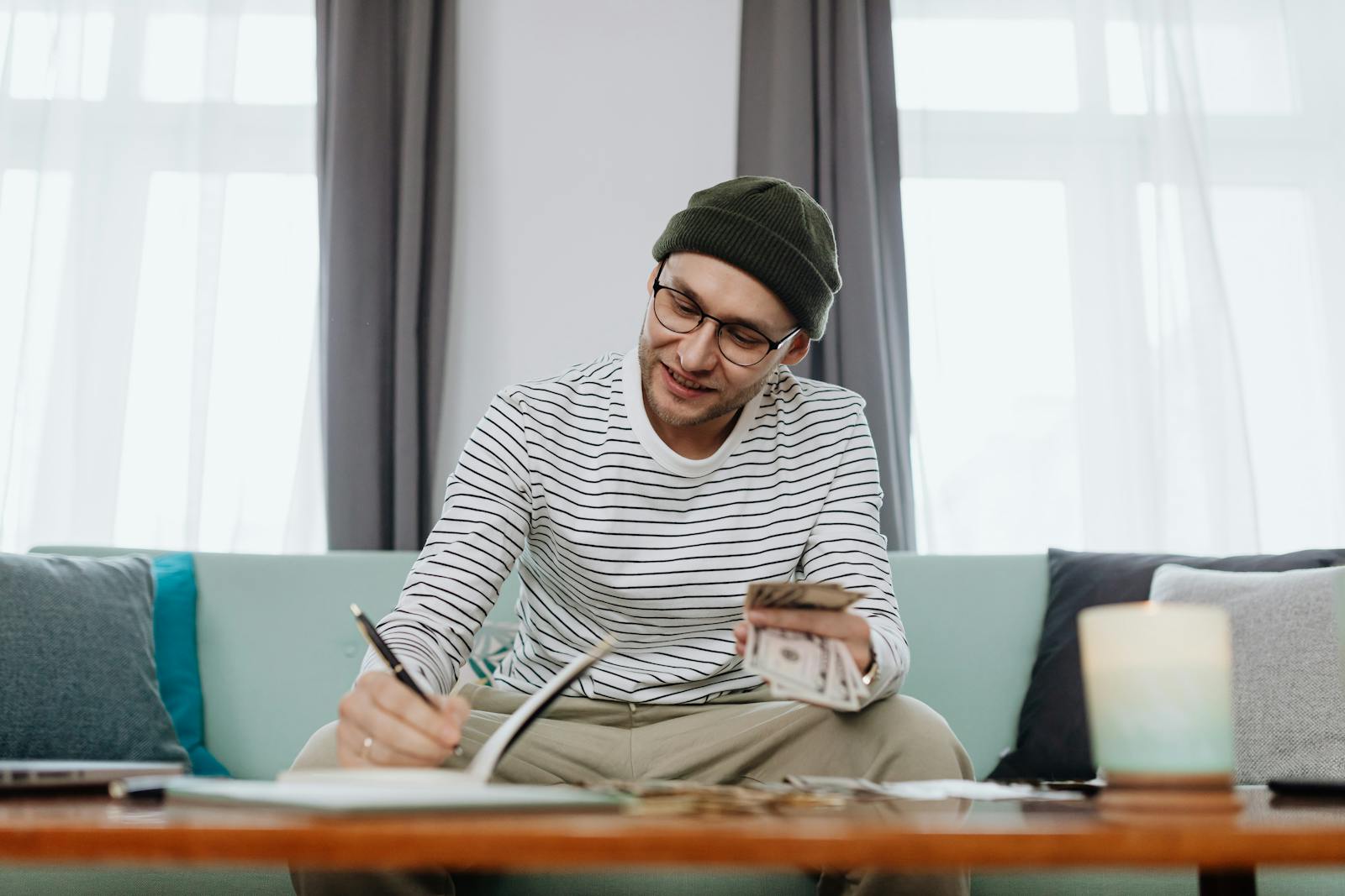 Man calculating his budget after paing alimony