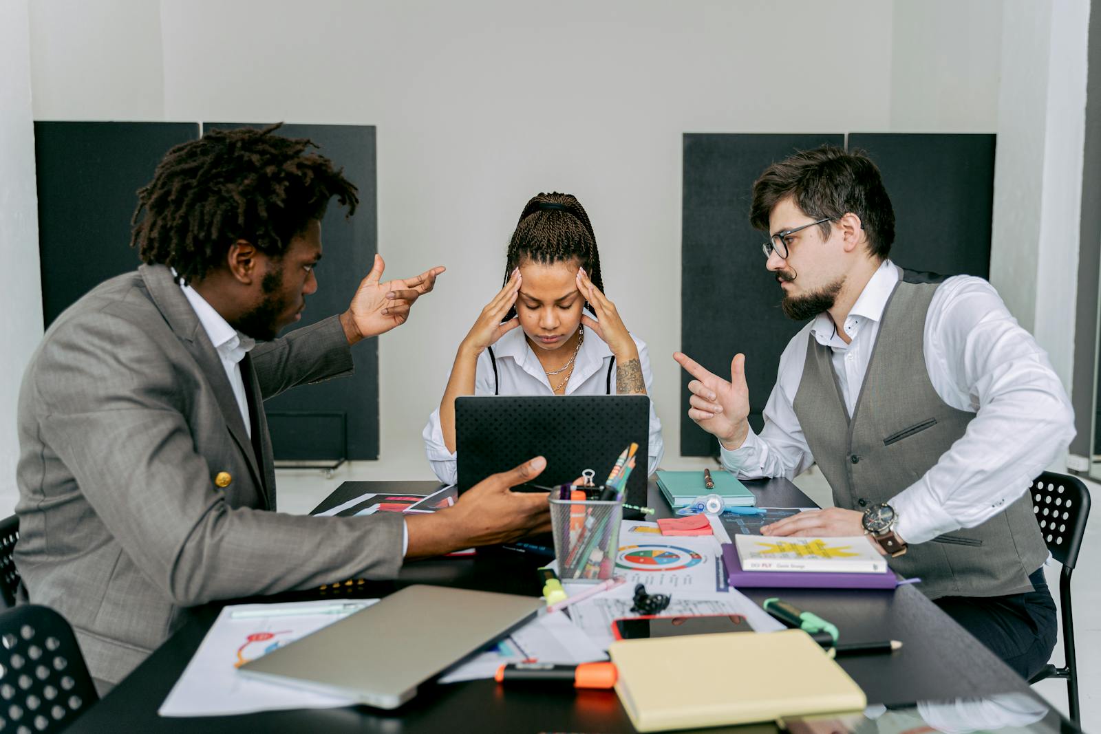 Couple arguing in the office of a divorce lawyer