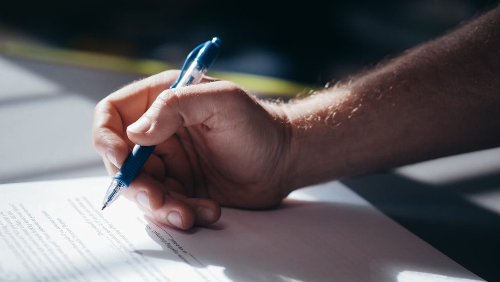 Person signing property division agreement