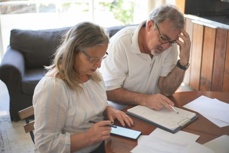 Elderly couple learning divorce papers