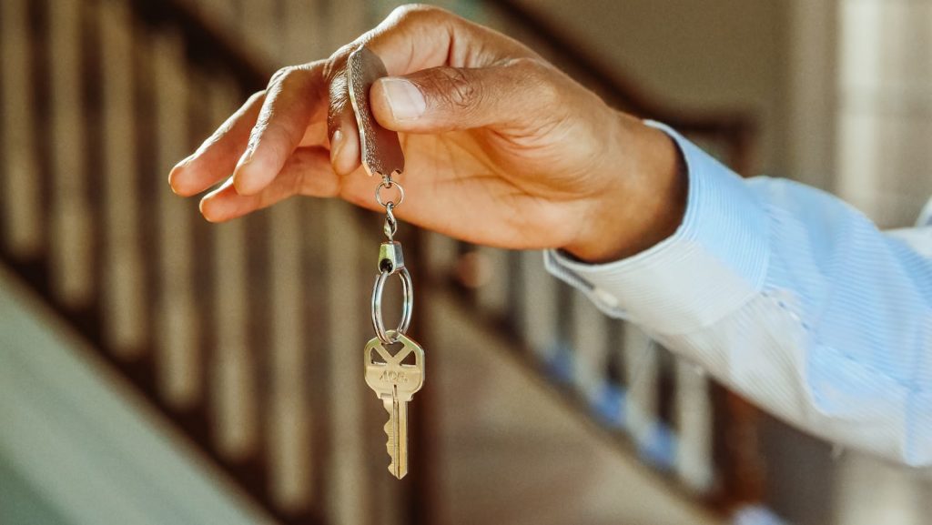 Divorced man holding a key