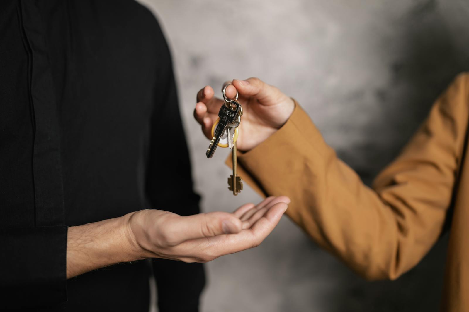 Wife giving keys to ex-husband