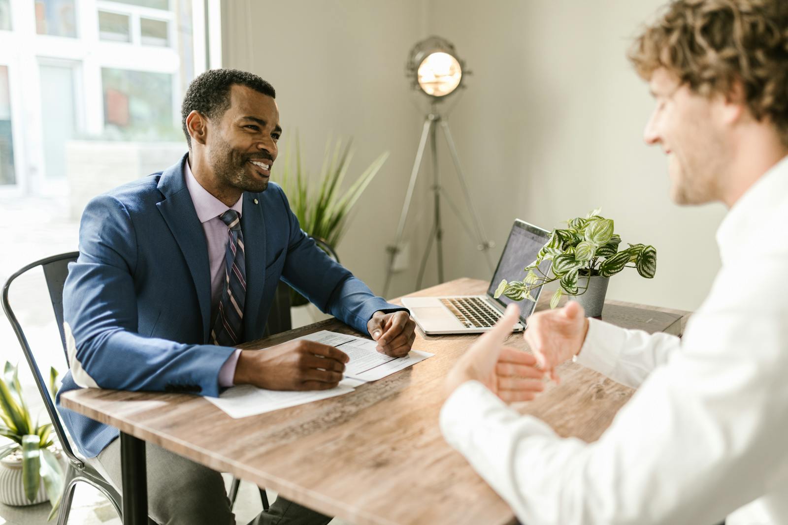 Man discussing his divorce case with lawyer