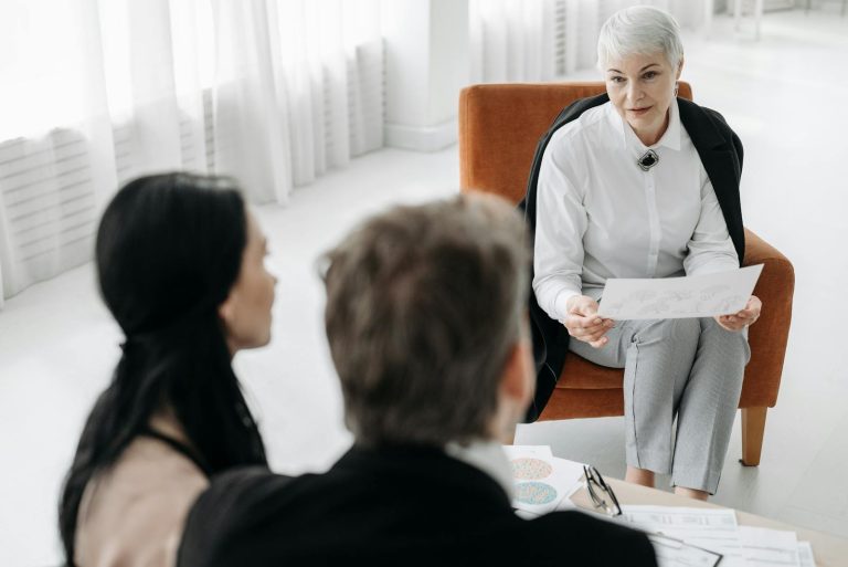 Couple having a meeting with mediator to discuss their case