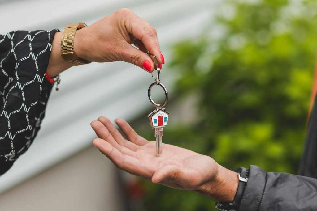 Woman returning house keys to ex-boyfriend