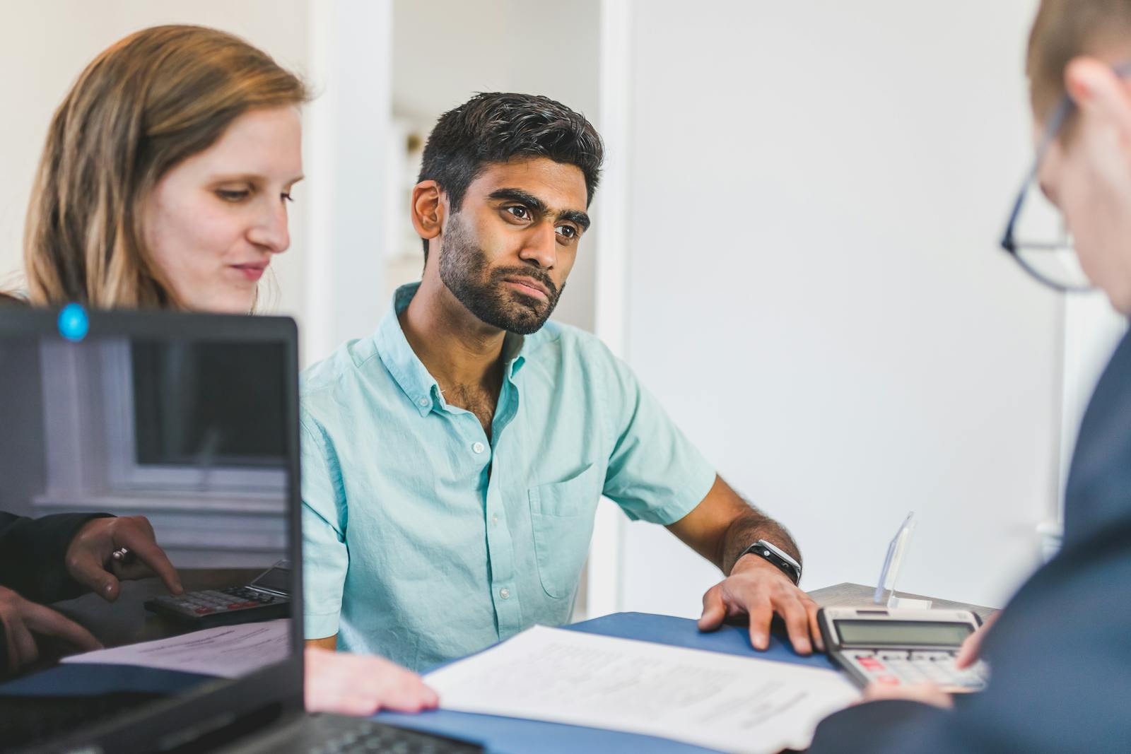 Couple having a meeting with arbitrator to resolve their legal issue