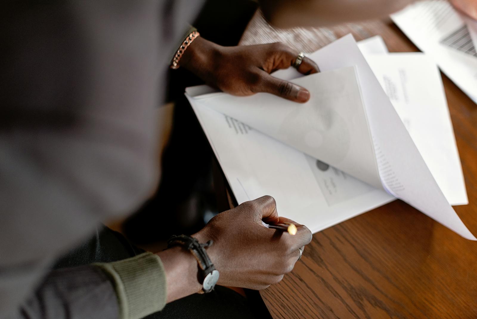 Husband signing a divorce documents